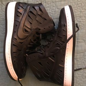 Nike cutout high top sneakers.